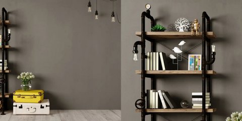 Minimalistischer Wohnraum mit mattschwarzen Regalen und lampen, Büchern und Deko.